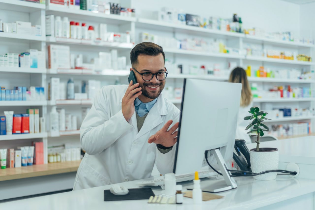 portrait-of-a-handsome-pharmacist-working-in-a-pharmacy.jpg